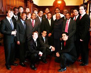 Happy moments: Archbishop Emeritus Desmond Tutu with some of the Smutsmen during a lunch to celebrate Smuts Hall's 80th birthday.