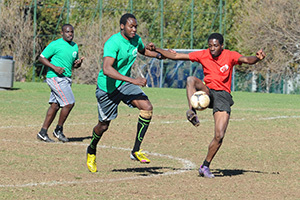 Close control: Johnny Oriokot (green), of Easoc vies for possession with Obi Chigozie of eventual winners Ghanasoc in UCT's third annual Mini Africa Cup of Nations on 17 May.