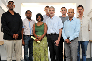 Front from left Claude Leon Merit Award recipients Drs Deena Pillay and John Ataguba with Prof Anusuya Chinsamy-Turan, HoD: Department of Biological Sciences, DVC Prof Danie Visser and Prof Mohamed Jeebhay, HOD: School of Public Health and Family Medicine. Back from left Prof Anton Le Roex, Dean of the Science Faculty, Dr Andrew Hamilton, Claude Leon Merit Award winner and Prof Andy Buffler, HoD: Physics.