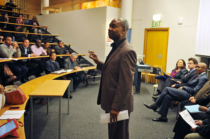 Council member Buyani Zwane facilitating a <a href="/article/-2014-08-14-the-race-to-equity-in-higher-education-institutions">debate on employment equity and affirmative action</a>, hosted by the university's Transformation Services Office in August 2014. (Photo by Je'nine May.)