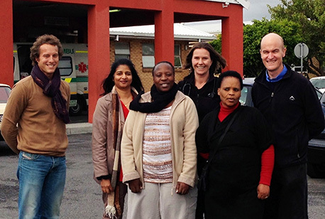 Pictured outside the GF Jooste Hospital, the South African site of the Cryptococcal Optimal Antiretroviral Timing Trial are from left: Friedrich Thienemann, Amy Nair, Yolisa Sigila, Charlotte Schutz, Monica Magwayi and Assoc Prof Graeme Meintjes. The team conducted the South African part of the collaborative study into when to start antiretroviral therapy following treatment for fungal meningitis.
