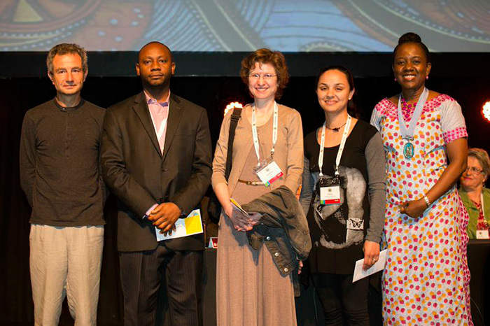 From left to right: Prof Bruno Falissard (France), President of IACAPAP, Dr Jibril Abdulmalik (Nigeria, 3rd prize), Lauren Wild (UCT, 1st prize with Fairuz Gabie), Tracy McClinton-Apollis (UCT, 2nd prize), Prof Olayinka Omigbodun (Nigeria), Past President of IACAPAP
