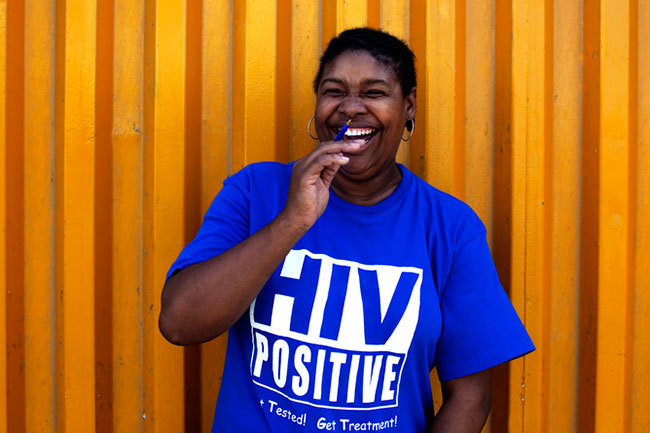 HIV positive T-shirts have been distributed to reduce the stigma attached to the disease. This would have been unthinkable 30 years ago. (Photo by Finbarr O'Reilly/Reuters.)