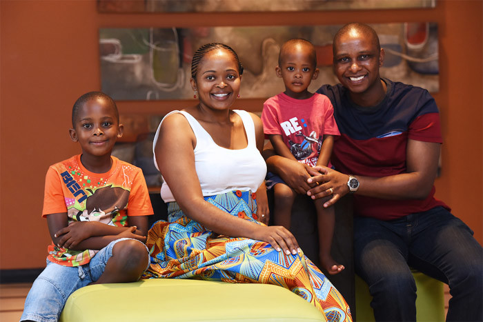 Family support: Dr Disa Mogashana says her family were behind her every step of the way. Pictured with her, from left, are her sons Rese (6), Tumiso (2) and husband Lucky. "My husband has been nothing else but a blessing. He's been supportive throughout," says Disa.