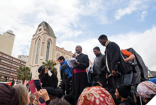 Archbishop Thabo Makgoba, who teaches a module on the GSB's Creating and Leading the Values-Driven Organisation, addresses the crowd at the recent anti-corruption march in Cape Town. Photo by Retha Ferguson.