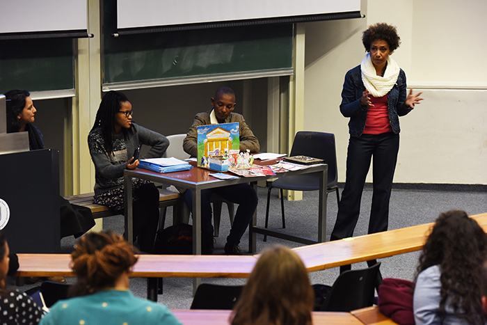 ​​​​​​​From left: Sianne Abrahams, Dela Gwala and Dr Zethu Matebeni unpacked UCT's response to sexual violence on campus at a forum organised by the Black Academic Caucus. Yaliwe Clarke, standing, chaired the discussion.