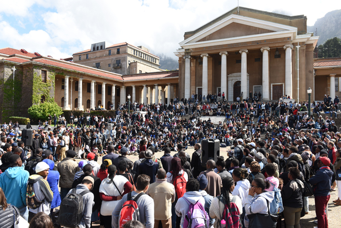 Students at a protest meeting outside Jameson Hall on Thursday, 15 September. Photo: Michael Hammond.