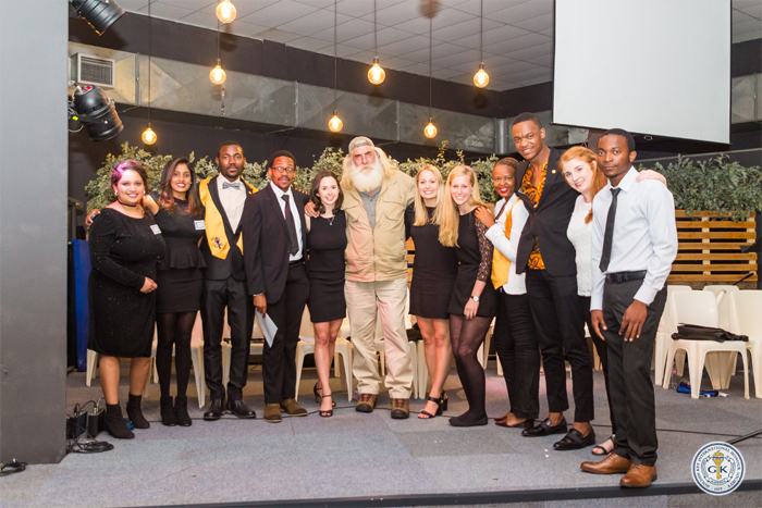 Kingsley Holgate with the UCT Golden Key Society committee members.