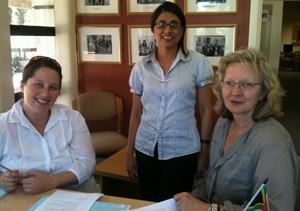 Enabled: Refugee Rights Project director Fatima Khan (middle) with senior Attorney Tal Schreier (left) and lead researcher Vicki Igglesden.