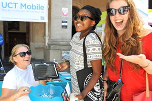 <b>Appsolute convenience:</b> Now the nifty new UCT Mobile application for smartphones and tablets allows students to - among other things - search for and reserve books, check the Jammie Shuttle timetable, and even check fee account balances. ICTS's Niki McQueen shows students Bobo Mthombeni (middle) and Jennifer Rackstaw (right), how it works.