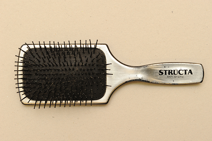 This hairbrush can be found among the many papers in this collection. Jack Simons loved to brush his wife's long hair.