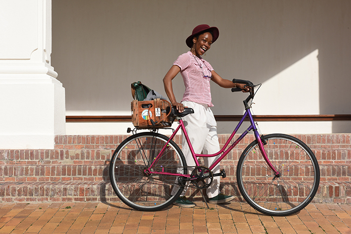 Chaze Matakala, a film and media student, chose this bicycle because of its colour, "Purple is my favourite colour," she says. Photo by Michael Hammond.