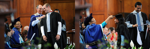 Father's footsteps: Prof Alastair Millar (BACK), of UCT's Division of Paediatric Surgery, hoods his son and MBChB graduate, James Millar - excuse us, Dr James Millar - at this morning's graduation ceremony for the Faculty of Health Sciences.