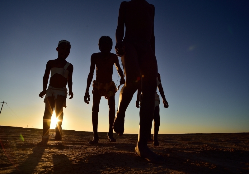 Elia Fester and children, Kalahari Khomani San Bushman, Boesmansrus camp, Northern Cape, South Africa.