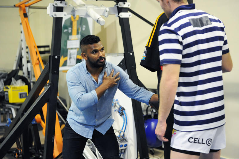 Dr Sharief Hendricks, who is designing a contact training programme for rugby players, tests the contact simulator. <strong>Photo</strong> Michael Hammond.