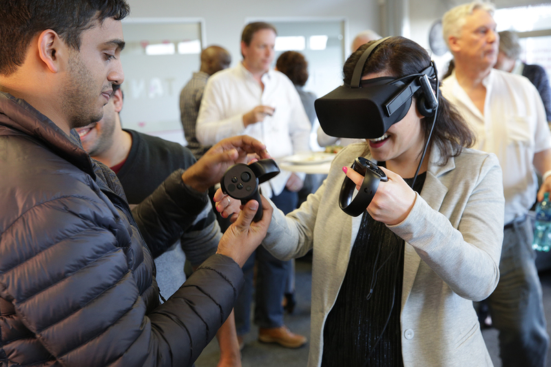 Students getting to grips with a virtual-reality headsets at the launch of UCT’s Innovation Lab last year.
