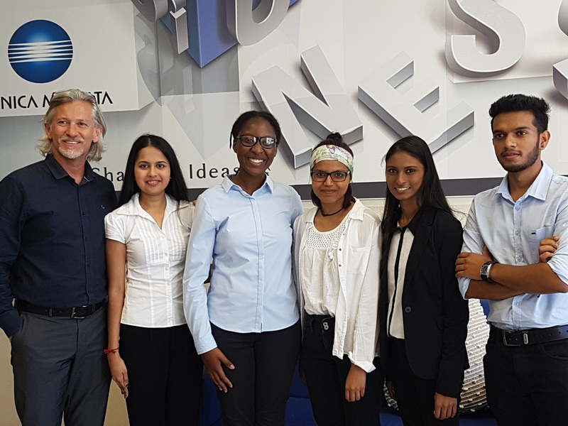 Richard Berg, manager of Corporate Business Solutions at KMSA Cape Town, with the UCT team that took national honours in the Konica Minolta International University Contest.
