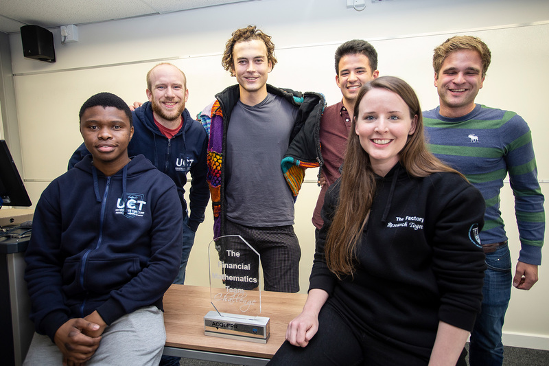 The winning team included UCT financial maths master’s students Bandile Mbele (left, front) and Cole van Jaarsveld (middle, back).