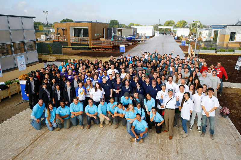 The official all-teams photo from last year’s Solar Decathlon in Denver, Colorado. The picture also shows the reassembled entries on the site. <b>Photo</b> <a href="https://www.solardecathlon.gov/2017/photos-event.html" target="_blank">Jack Dempsey, US Department of Energy Solar Decathlon</a>.