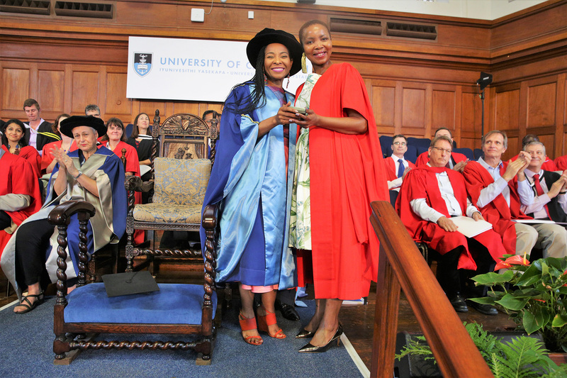 Lauded academic, author, activist and UCT alumnus Prof Pumla Dineo Gqola (right) received the President of Convocation medal from VC Prof Mamokgethi Phakeng.