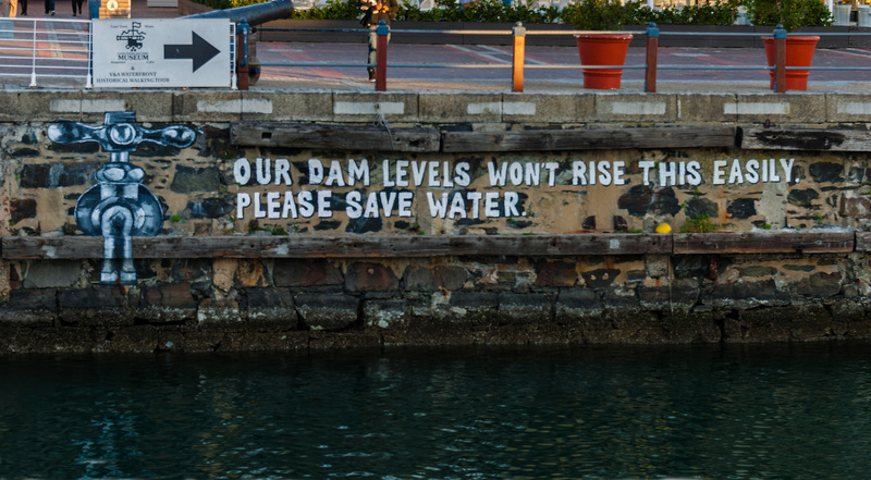 A mural promoting water conservation efforts on a retaining wall at Cape Town's V&A Waterfront during the height of the water restrictions in 2018.