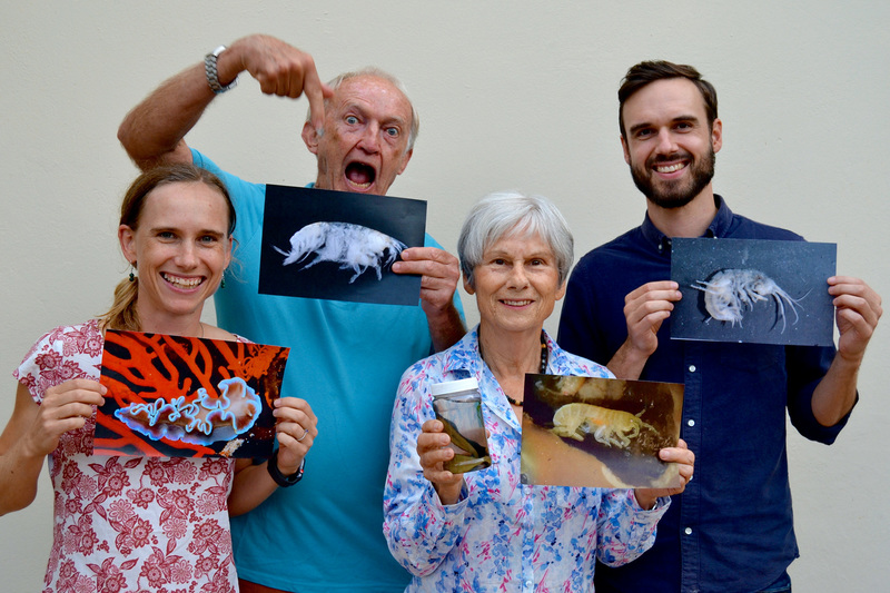 Members of the Griffiths family with images of the marine and freshwater species named after them. They are (from left) Dr Melinda Griffiths, Emer Prof Charles Griffiths, Dr Roberta Griffiths and Matthew Griffiths. <b>Photo</b>&nbsp;Supplied.