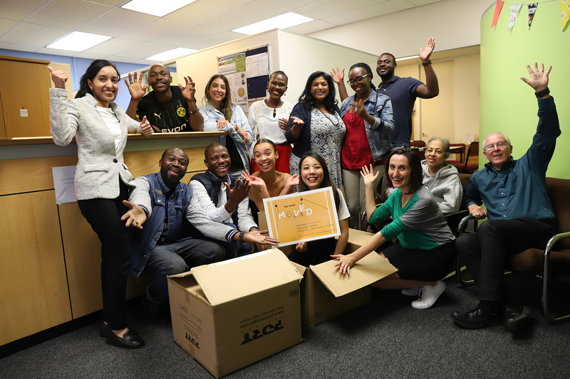 The Writing Centre team packs up ahead of their move to their new home in the main library’s Vincent Kolbe Knowledge Commons. They are (back from left) Gustav Mbeha, Nicole Isaacs, Yakhuluntu Dubazana, Desireé Moodley, Kendi Osano and Zimpande Kawanu, and (front from left) Aditi Hunma, Joel Ntando, Munashe Chideya, Qiniso van Damme, Jenny Pan, Gabrielle Nudelman, Gadija Arend and Deryck Sheriffs.