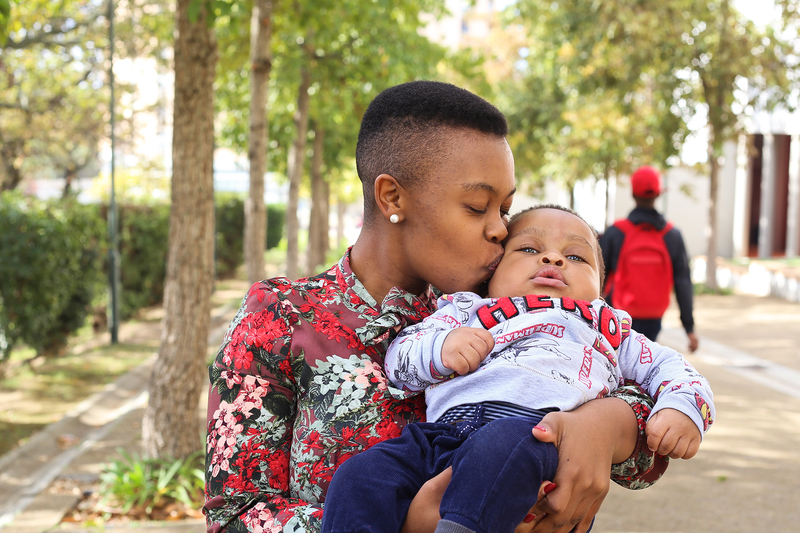 Juggling parenthood and postgraduate studies: master’s student Naledi Maponopono with her son, Lubanzi. 