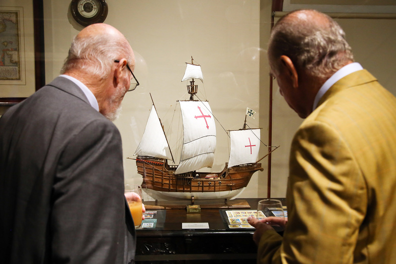 Guests at the exhibition to mark the 500th anniversary of the first circumnavigation of the globe examine a model of the Victoria, the only one of a fleet of five Spanish ships to complete the voyage. 