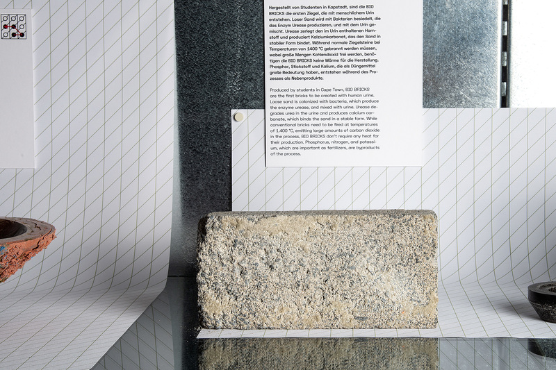 The world’s first bio-brick made from urine on display at the MAK Design Lab in Austria. The other objects visible in the image are “Blood-related” by Basse Stittgen and “Protein Bowl” by Tessa Silva.
