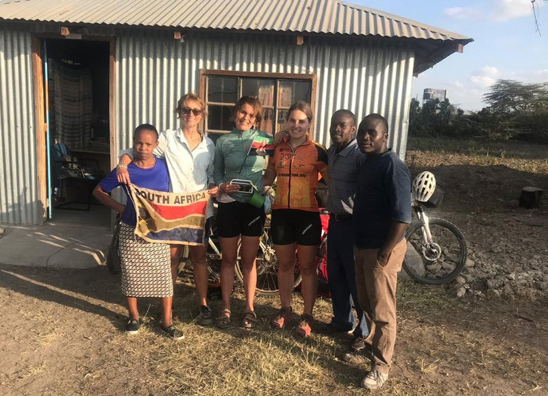 Deep in rural Africa, and without Wi-Fi, some good fortune helped civil engineering master’s graduate Suzanne Lambert&nbsp;(third from left) turn in final corrections on her thesis.