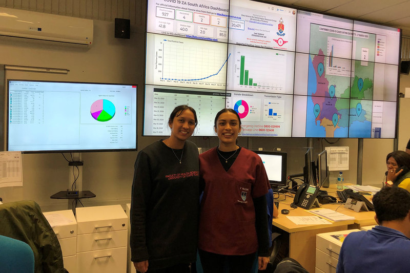 Fourth-year medical students Huda Abrahams (left) and Zaahidah Razzak are part of an over 100-strong group of UCT medical student volunteers who are staffing the COVID-19 hotline at Tygerberg Hospital’s Disaster Management Centre.