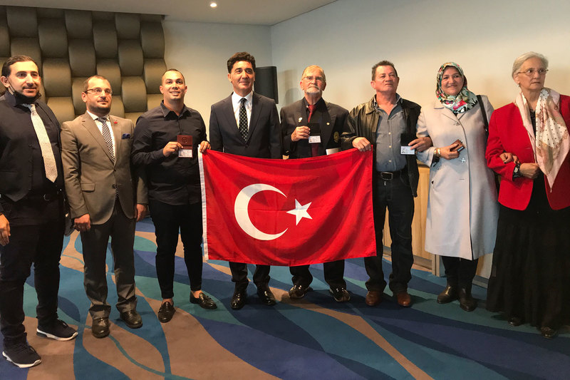 Dr Halim Gençoğlu (far left) photographed with Ottoman descendants who were awarded Turkish citizenship on 24&nbsp;November. Turkish consul-general, Sinan Yeşildağ (in dark suit), presented the identity documents.