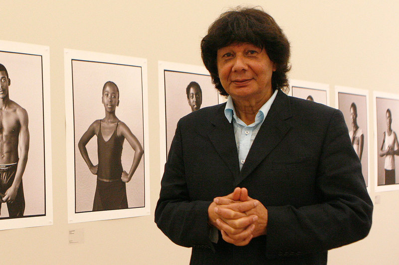 South African photographer George Hallett in front of his images at the Iziko Art Gallery in Cape Town.