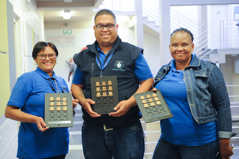 Members of UCT’s Estates and Custodial Services staff received magnetic badges in recognition of their participation in a digital literacy programme.