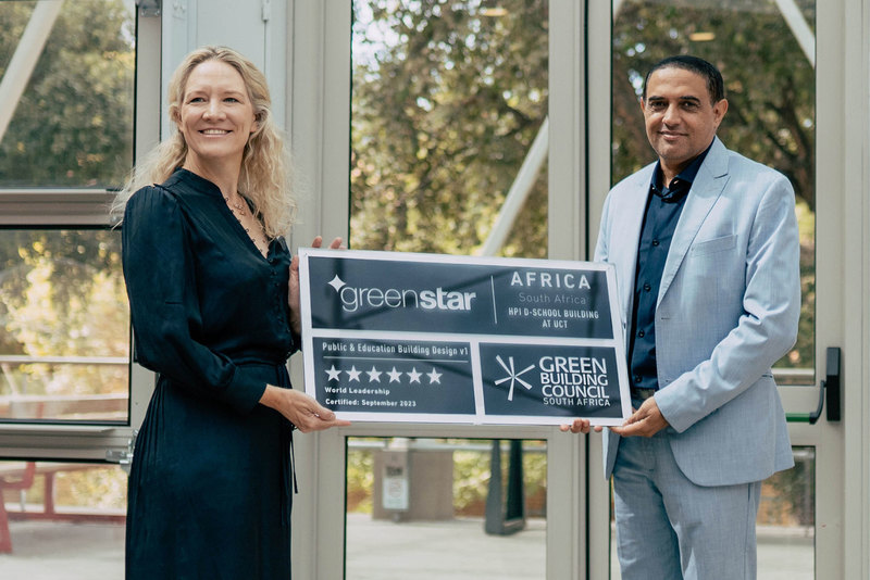 A plaque handover was the final seal on d-school Afrika’s exceptional 6-Star rating by the Green Building Council SA, marking its position as a flagship on the continent, and beyond. In picture: Dr Kristina Plattner of the Hasso Plattner Foundation (left) and Mughtar Parker, executive director of Properties & Services at UCT.