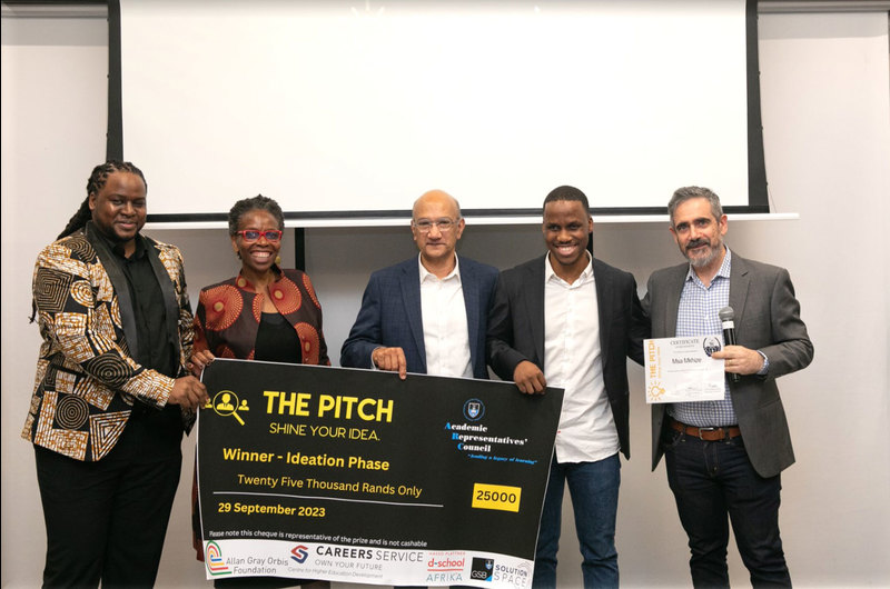 Msawenkosi Mkhize (second from right) won first prize in The Pitch UCT 2023 for his business, Amanzi Impilo.