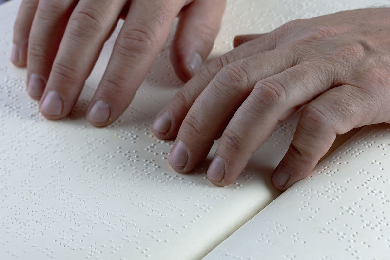 Because there are no accessible teaching and learning resources to support learners with visual impairments in Cameroon, learners need to come up with their own methods of understanding the curriculum. <b>Photo</b> <a href="https://pixabay.com/photos/braille-hands-keys-read-5498805/" target="_blank">Pixabay.</a>