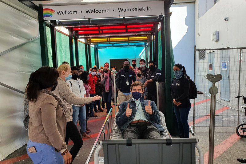 Clinical team performing a “dry run” of the admissions process at the patient-receiving entrance of the Hospital of Hope at the Cape Town International Conference Centre on 7 June. UCT medical staff were among those who set up this field hospital from scratch to deal with rising COVID-19 cases. <b>Photo</b> Supplied.