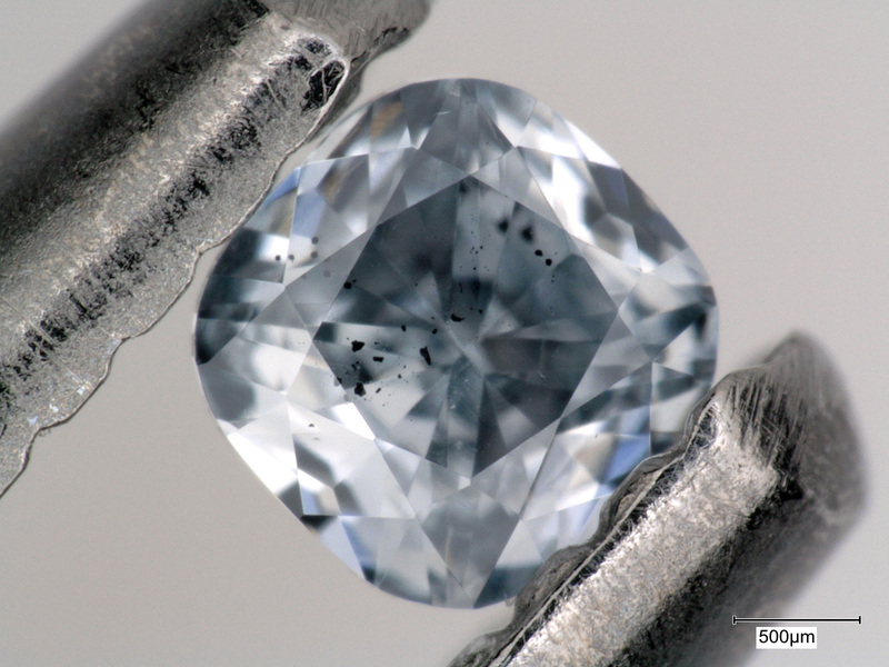 One of the blue diamonds with mineral inclusions that was examined as part of this research, which investigated the origin of these gems.