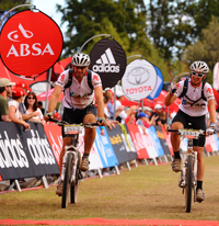 Prof Marc Mendelson and his son, Ben, finish the Absa Cape Epic