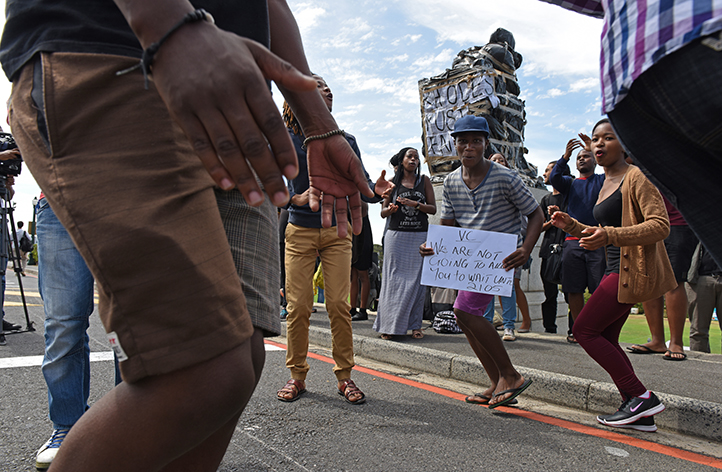 Protesters made it clear that they want action taken, as this demonstrator&rsquo;s placard shows at a 19 March gathering around the statue. Photo by Michael Hammond.