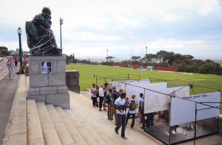 Members of the UCT community wrote their views about the statue and the broader transformation debate on &lsquo;have your say&rsquo; boards erected beneath the statue&rsquo;s plinth. Photo by Je&rsquo;nine May.