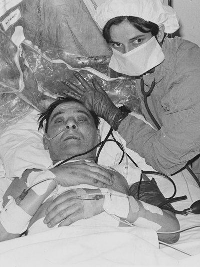 A nursing staff member helps Louis Washkansky, the world’s first successful heart transplant patient, after the marathon six-hour operation. Washkansky lived for 18 days after the operation, before dying of pneumonia-related complications.