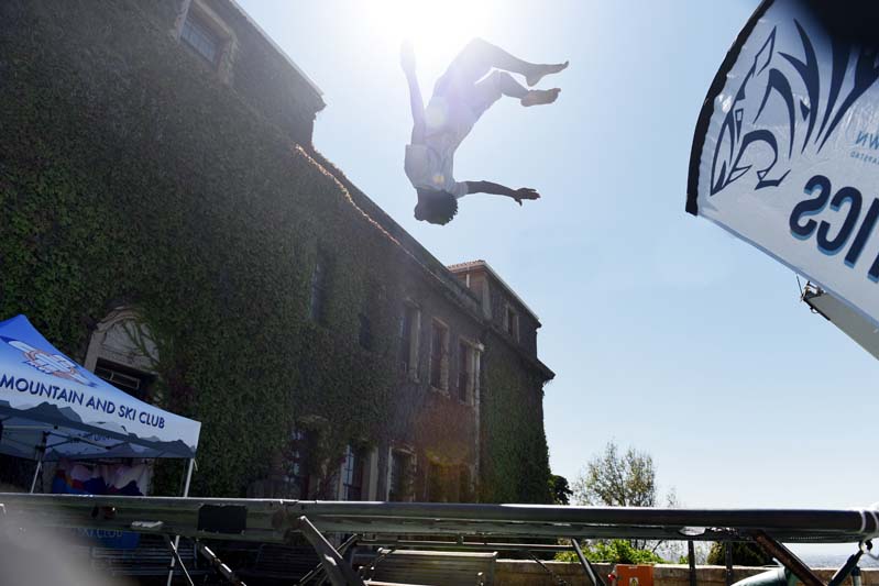 A student from the UCT Gymnastics shows off his backflipping tricks during Plaza Week.