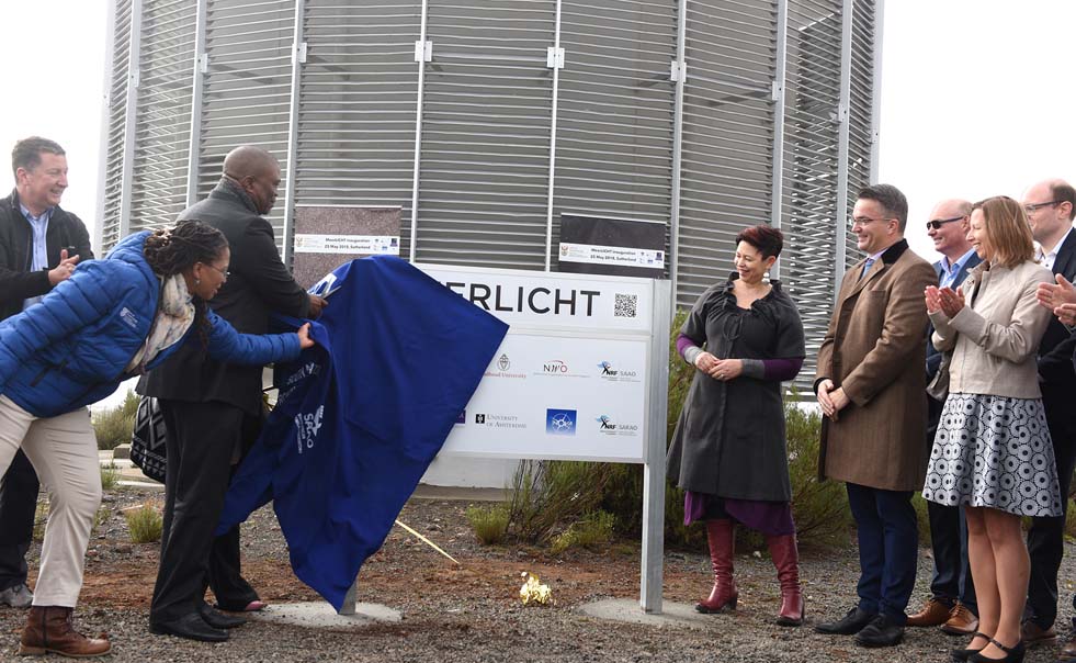 Department of Science and Technology director-general Phil Mjwara and UCT Deputy Vice-Chancellor Professor Loretta Feris unveil the new telescope in Sutherland.