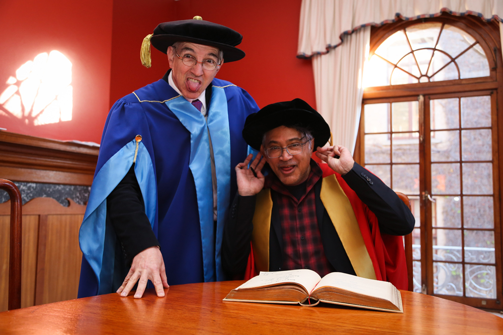 Dr Price shares a light-hearted moment with honorary graduate Zackie Achmat in the moments leading up to the July 2017 graduation ceremonies.