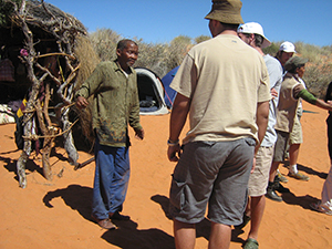The late Oom Dawid Kruiper talking to UCT student on a field trip to the Kgalagadi Transfrontier Park