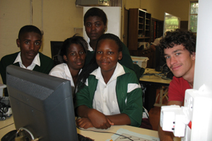 New moves: Enjoying the challenge of developing robots are Uxolo High School learners (from left) Nyameko Mntuyedwa, Namhla Baartman, Nwabisa Mthiyane, Zikhona Tsutsu. Providing a guiding hand was Cameron Sharp, a master's student in the Department of Mechanical Engineering.