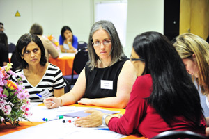 Taking stock: Photographed during the group discussions at the ADAPT Lekgotla in December were (facing the camera) Yasmin Fazel-Ellahi, left, and Claire Kelly